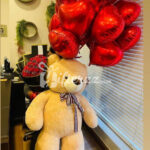 Big Teddy Bear with Roses and Balloons